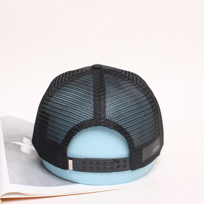 AMIRI star-patch panelled trucker cap